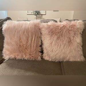 Furry/fluffy decorative pink pillows. Set of 2.